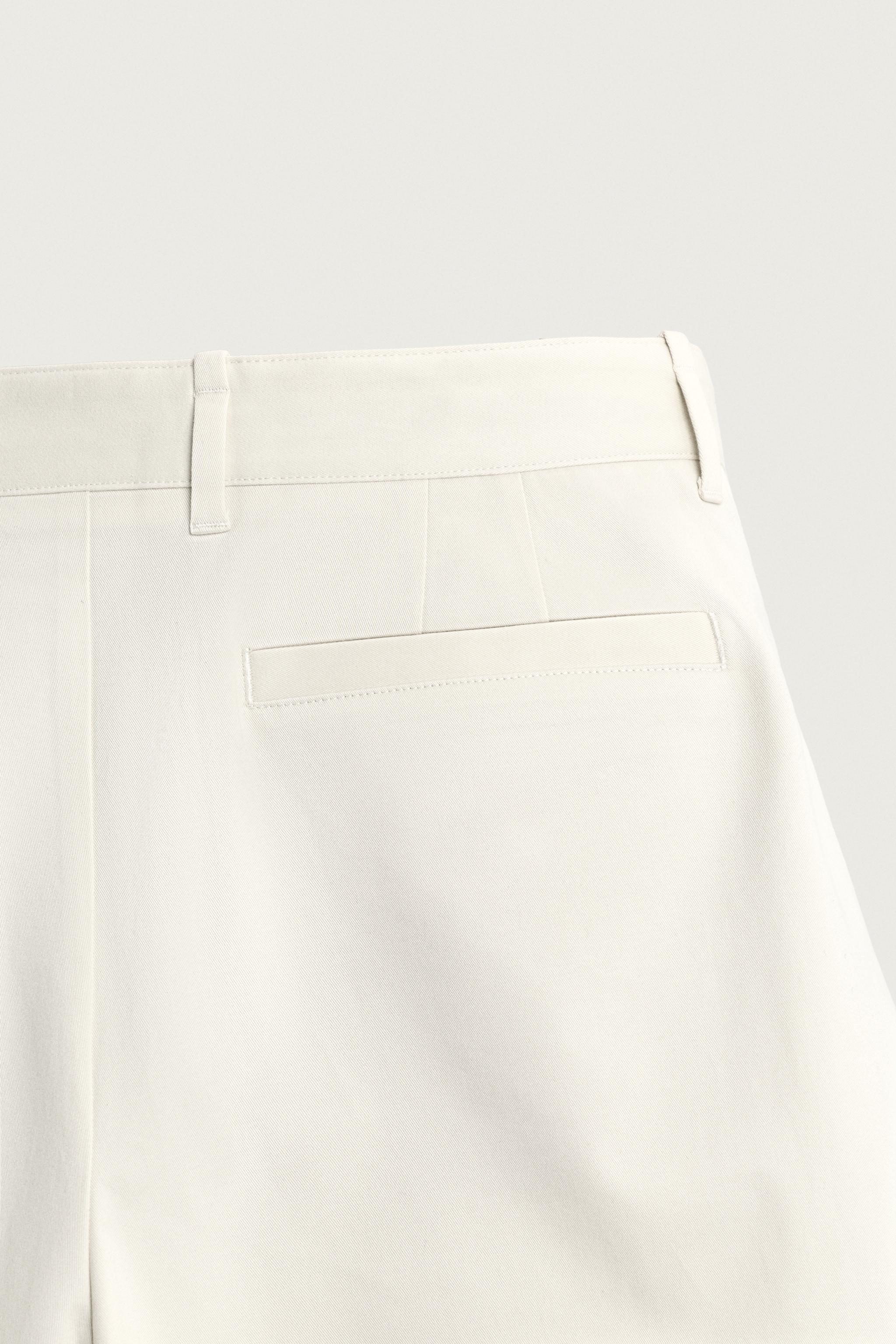 WIDE FIT PLEATED SHORTS